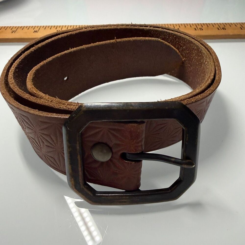Gap genuine leather embossed belt with an all-over geometric/starburst pattern
